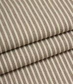 Folded Wedmore Wide woven stripe fabric showing the soft texture and drape of the upholstery material.