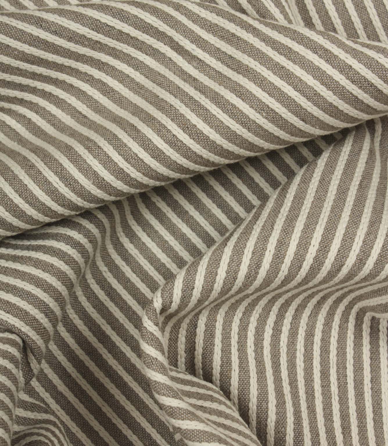 Draped Wedmore Wide striped fabric highlighting the woven embroidered texture and natural movement.