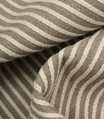 Detailed close-up of Wedmore Wide upholstery fabric folds showcasing the raised woven stripe design.