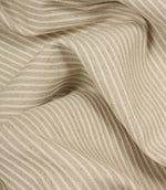 Draped Wedmore Wide striped fabric with soft flowing folds, showing its textured woven surface and narrow stripe pattern.