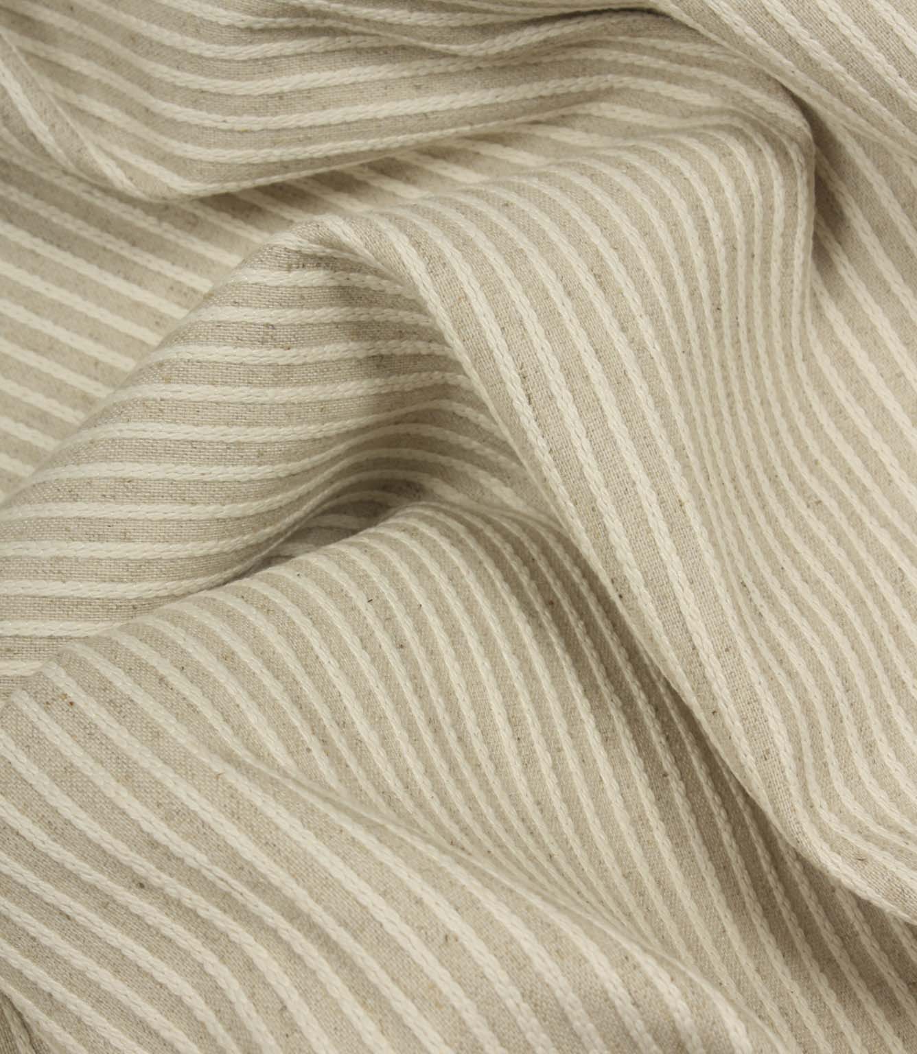 Draped Wedmore Wide striped fabric with soft flowing folds, showing its textured woven surface and narrow stripe pattern.