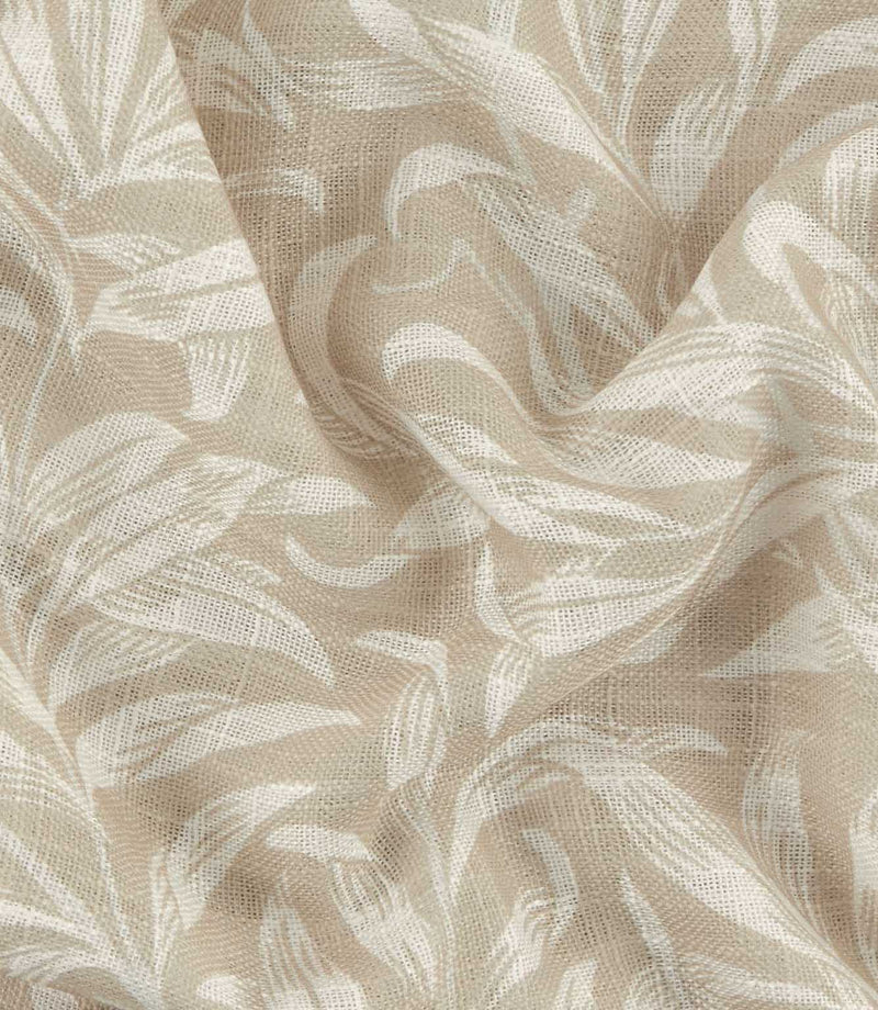 Close-up of Pure Willow Boughs sheer 100% cotton fabric in linen beige and ivory, showing the open woven texture and flowing William Morris willow leaf pattern.