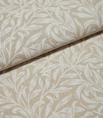 Folded Willow Bough Linen Look fabric in warm beige and cream, highlighting the repeating leafy pattern and textured linen-look weave.