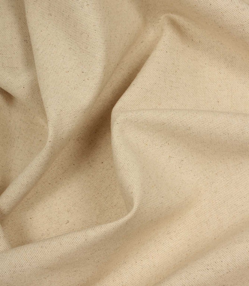 Close-up of beige fabric with a textured pattern