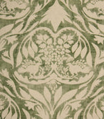 Decorative fabric pattern with floral and leaf design on a green background
