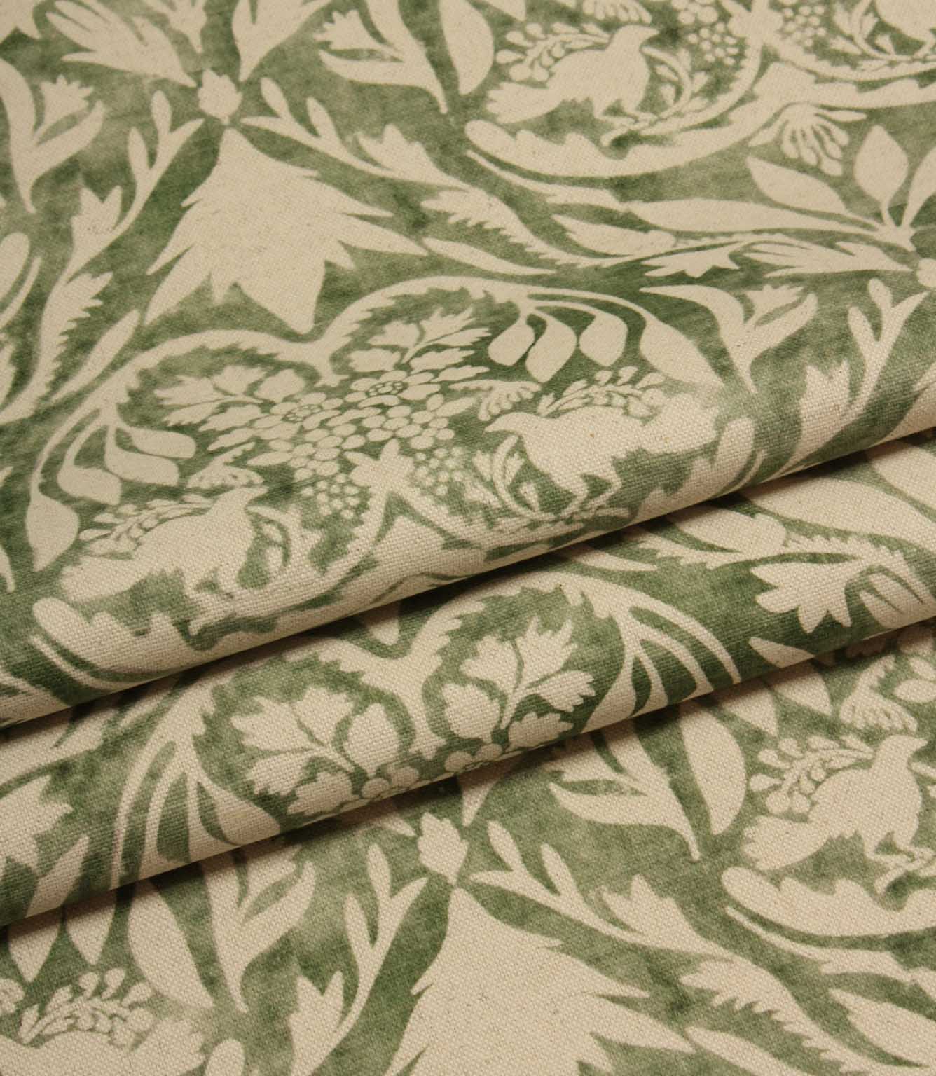 Green and white floral and leaf patterned fabric