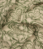 Green and beige patterned fabric