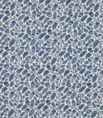 Woodcliff Nautica fabric featuring a small-scale Scandinavian-inspired botanical pattern of stylised oak leaves, acorns and delicate branching stems in varying shades of navy and muted blue against an ivory background.