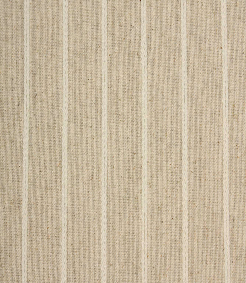 Close-up of Wooton Wide extra wide upholstery fabric showing textured embroidered stripes on a woven base.