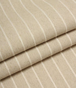 Folded Wooton Wide upholstery fabric featuring embroidered stripe detailing and a relaxed woven finish.